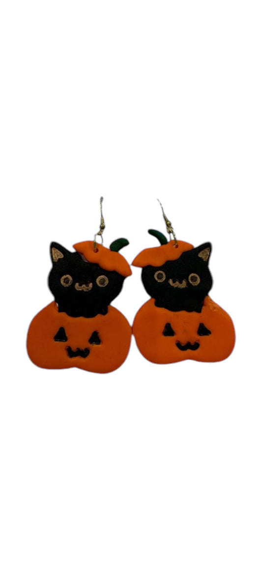 Kitties In Pumpkins